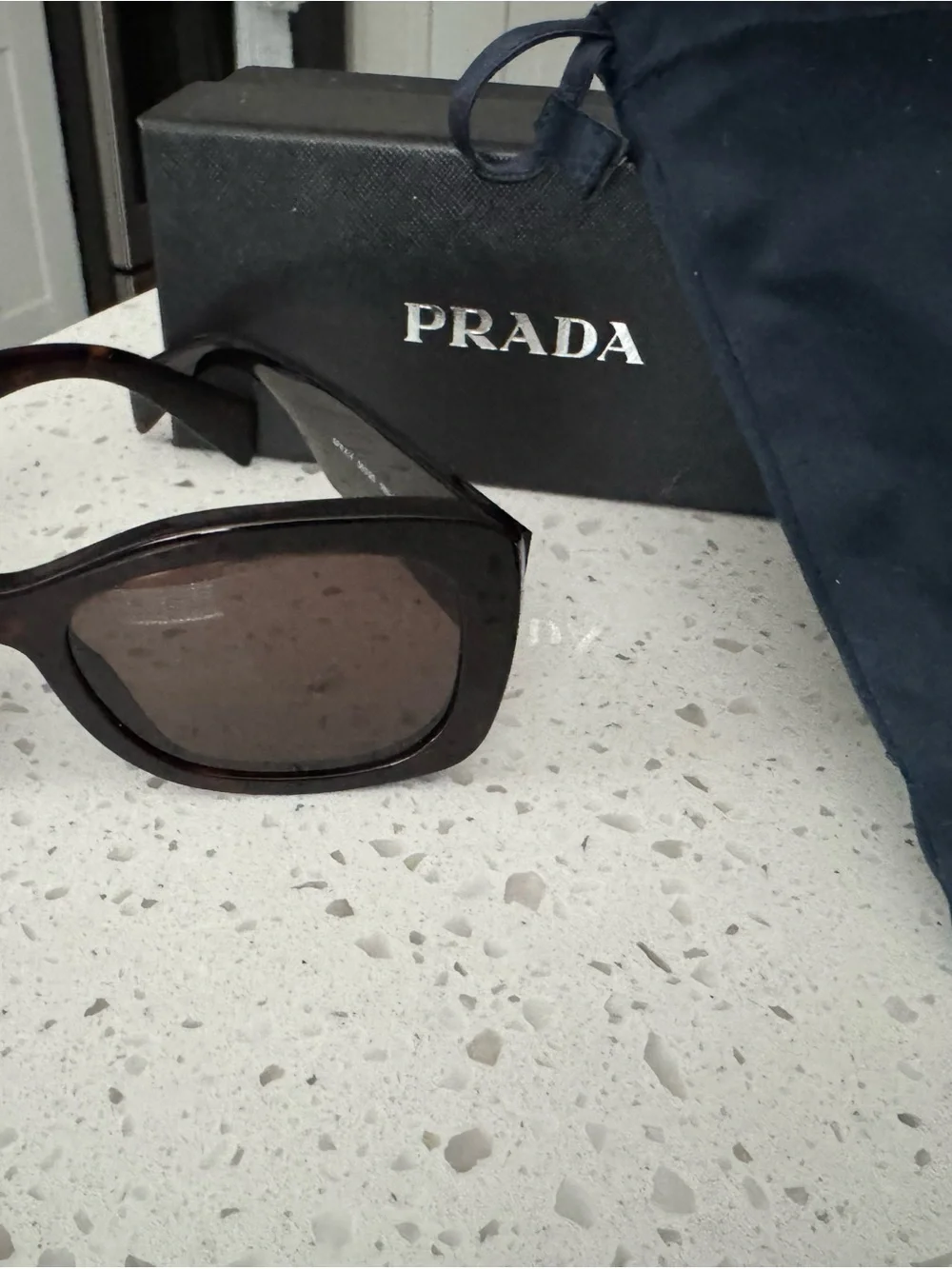 Prada Women's Sunglasses — Dark Brown Frame with Brown Lenses